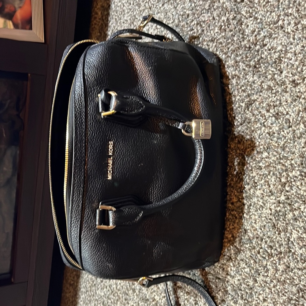 Michael kors bucket bag.
